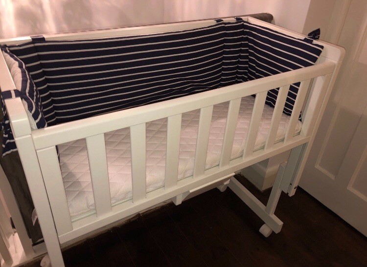 next to me wooden crib